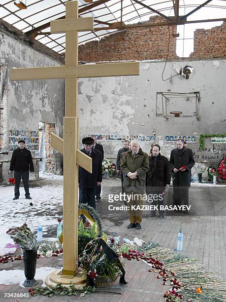 Beslan, RUSSIAN FEDERATION: Council of Europe Commissioner for Human Rights Thomas Hammarberg pays his respect at the destroyed gym in Beslan,...