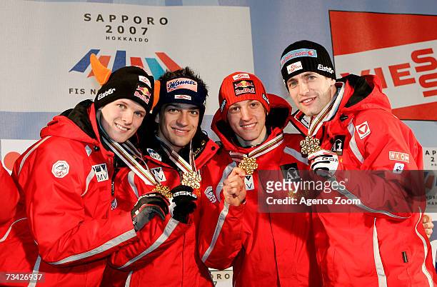 The team from Austria Thomas Morgenstern, Gregor Schlierenzauer, Andreas Kofler and Wolfgang Loitzl take Gold during the FIS Nordic World Ski...