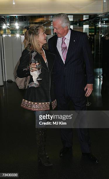 Maya Flick and chairman of Selfridges Galen Western arrive at the Holly Peterson's 'The Manny' Book launch party held at Selfridges on February 26,...