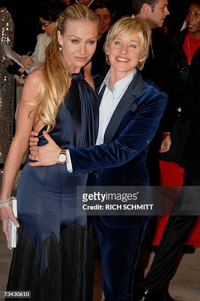 West Hollywood, UNITED STATES: CORRECTION-ADDING NAME Academy Award hostess Ellen DeGeneres and her partner Portia de Rossi arrive at the Vanity Fair...