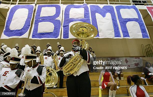 Highland Hills, UNITED STATES: A member of the Shaw High School band gets ready before US Democratic presidential hopeful Senator Barack Obama from...