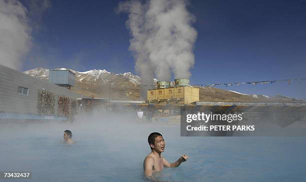 Lunar-China-tourism-Tibet Wang Xi , a 25-year-old architect from Beijing enjoys bathing at the 4300m hot springs in Yangbajing, 90 kilometers north...