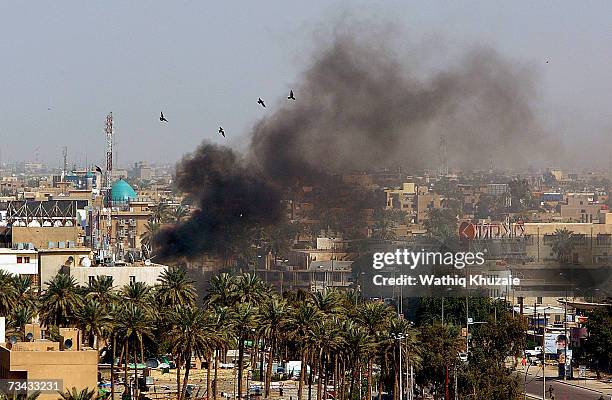 Smoke rises from a car bomb explosion on February 27, 2007 in Baghdad, Iraq. At least five people were killed in this incident and a further 2 people...