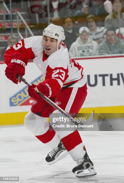 Mathieu Schneider of the Detroit Red Wings passes the puck during the NHL game against the Philadelphia Flyers on February 12, 2007 at the Wachovia...