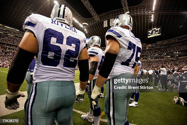 Dallas Cowboys linemen Marco Rivera and Marc Colombo look on against the Washington Redskins at Texas Stadium in Dallas, Texas on September 17, 2006....