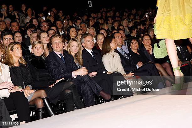 Segolene Frere, Alessandro Vallarino Gancia, Delphine Arnault and Bernard Arnault attend the Christian Dior Fashion show as part of Paris Fashion...