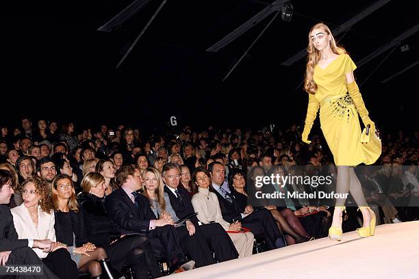 Segolene Frere, Alessandro Vallarino Gancia, Delphine Arnault and Bernard Arnault attend the Christian Dior Fashion show as part of Paris Fashion...