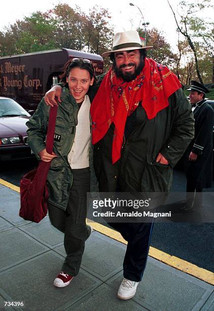 Italian opera legend Luciano Pavarotti and girlfriend Nicoletta arrive in New York November 8, 2000 for a Saturday concerto in Atlantic City, NJ.