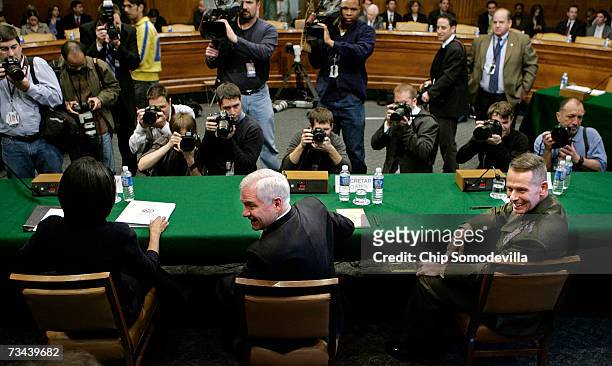 Secretary of State Condoleezza Rice , Defense Secretary Robert Gates and Chairman of the Joint Chiefs of Staff Gen. Peter Pace, USMC, face the news...