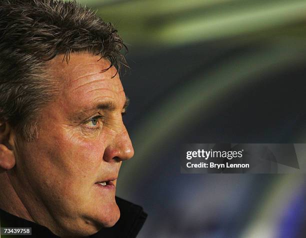 Birmingham City Manager Steve Bruce keeps an eye on his team during the Coca-Cola Championship game between Birmingham City and Leeds United at St...