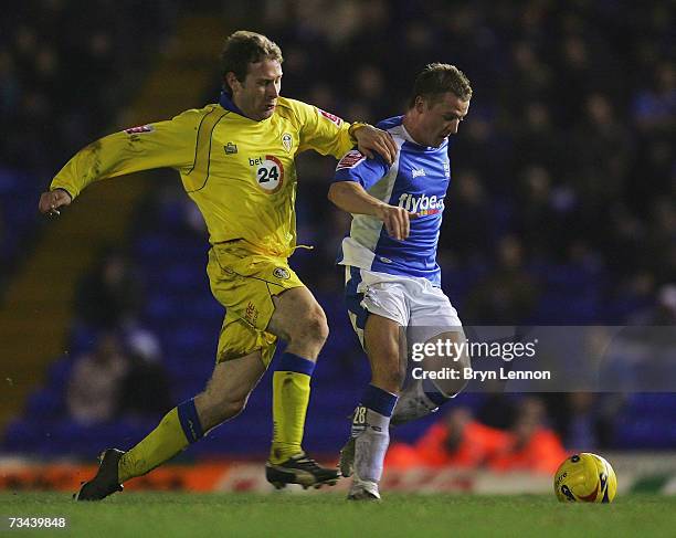 Ian Moore of Leeds United tackles Gary McSheffrey of Birmingham City during the Coca-Cola Championship game between Birmingham City and Leeds United...