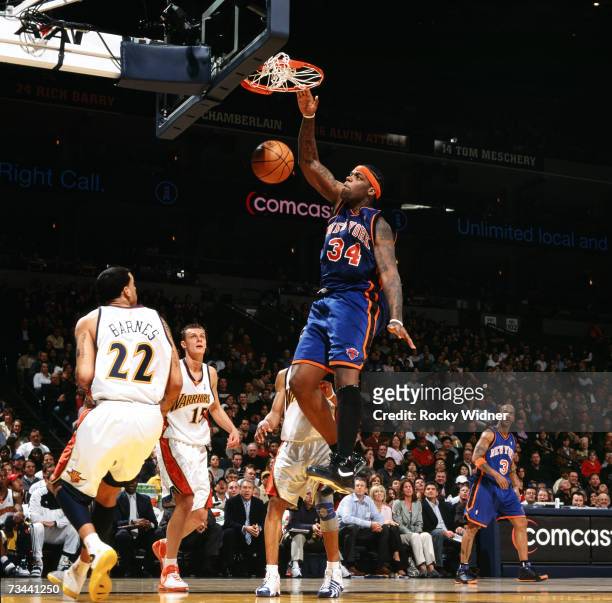 Eddy Curry of the New York Knicks dunks during a game against the Golden State Warriors at Oracle Arena on February 14, 2007 in Oakland, California....