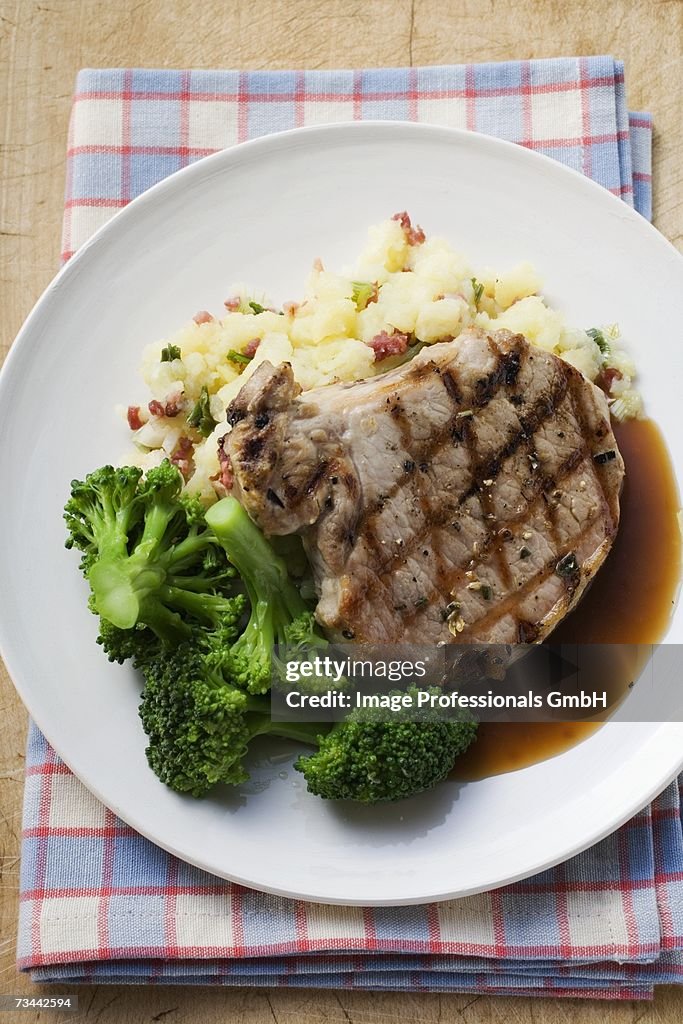 Pork chop with broccoli and mashed potato