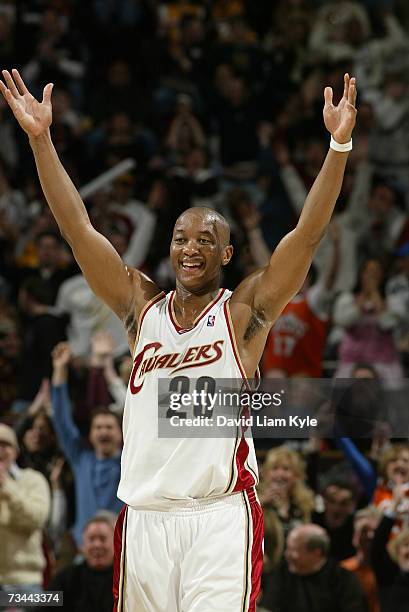 Eric Snow of the Cleveland Cavaliers smiles and raises his hands against the Los Angeles Lakers during the game at Quicken Loans Arena on February...