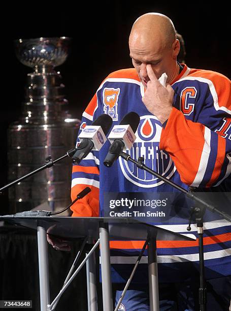 Former Edmonton Oilers great Mark Messier makes a speech during a ceremony to raise his banner to the rafters of Rexall Place prior to the Oilers NHL...