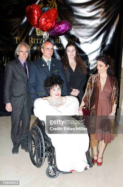 Dame Elizabeth Taylor arrives with her children, Michael Wilding Jr., Christopher Wilding, Maria Burton and Liza Todd Burton, for Taylor's 75th...