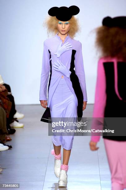 Model walks the catwalk during the Comme Des Garcons fashion show as part of Paris Fashion Week Autumn/Winter 2008 on February 27, 2007 in Paris,...