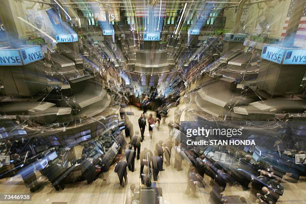 New York, UNITED STATES: Traders work on the floor of the New York Stock Exchange after the opening bell, 28 February 2007, one day after a large...