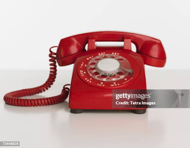 close up studio shot of rotary telephone - vaste telefoon stockfoto's en -beelden