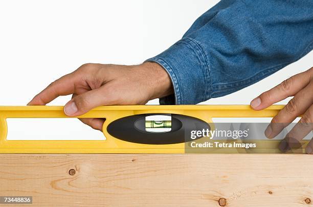 Man Using Level 688 Spirit Level Hand Stock Photos, High-Res Pictures, and Images ...