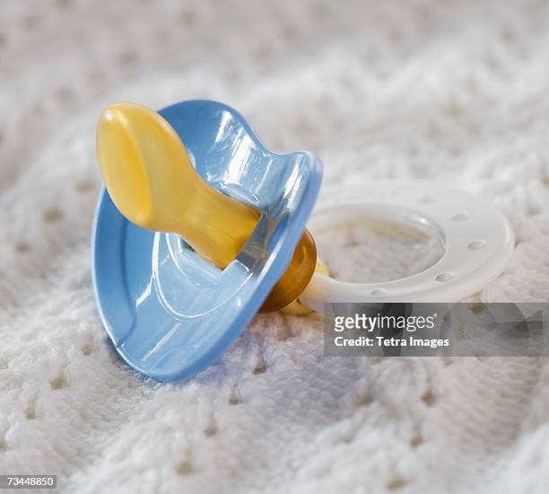 close up of baby's pacifier - pacifier stock pictures, royalty-free photos & images
