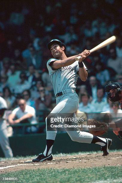 Outfielder Roy White, of the New York Yankees, watches the flight of the ball he's hit during a game in 1976 against the Detroit Tigers at Tiger...