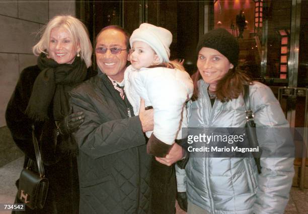 Singer and entertainer Paul Anka holds his grandaughter, Allegra while posing November 21, 2000 on 5th Avenue in Manhattan. Anka, who recently...
