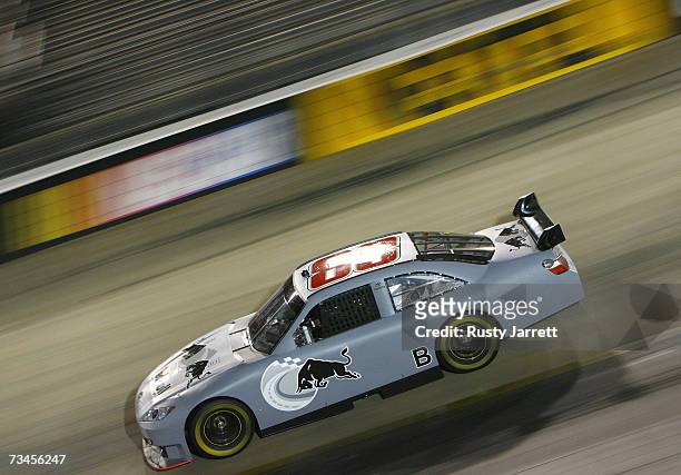 Brian Vickers, driver of the Red Bull Toyota drives during NASCAR Car of Tomorrow testing under the lights at Bristol Motor Speedway on February 28,...