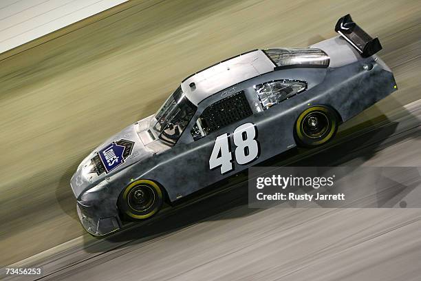 Jimmie Johnson, driver of the Lowes Chevrolet drives during NASCAR Car of Tomorrow testing under the lights at Bristol Motor Speedway on February 28,...