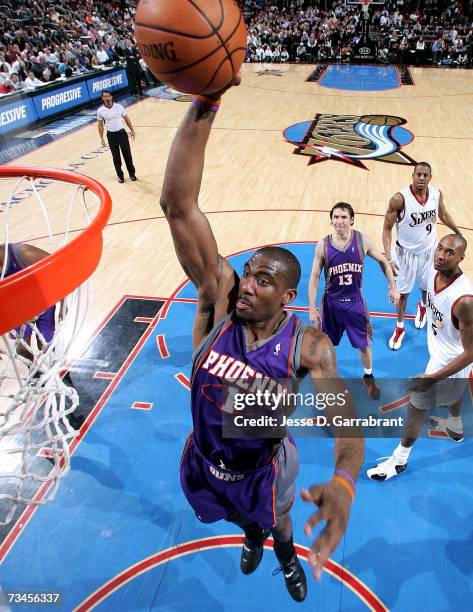 Amare Stoudemire of the Phoenix Suns shoots against the Philadelphia 76ers on February 28, 2007 at the Wachovia Center in Philadelphia, Pennsylvania....