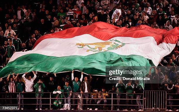 Mexican fans wave a giant flag against Venezula during the second half of the Mexico v Venezula friendly match on February 28, 2007 at Qualcomm...