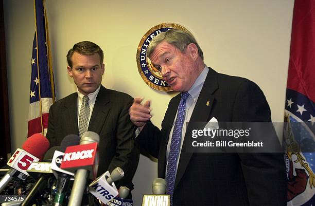 Senator Christopher "Kit" Bond and attorney Thor Hearne, left, talk about the problems that occured in the polling places on election night, November...