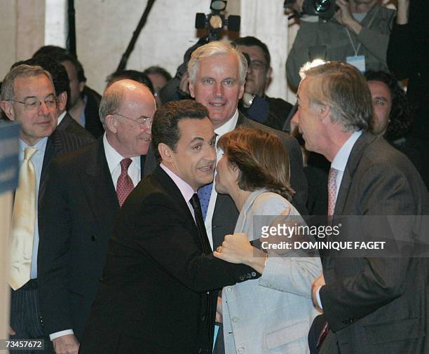 French presidential candidate Nicolas Sarkozy kisses French Minister Delegate for European Affairs Catherine Colonna as he arrives with former...