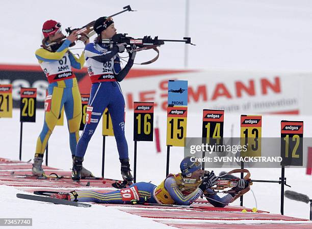 Lahti , FINLAND: Overall World Cup leader Sweden's Anna Carin Olofsson shoots in a prone position as she competes to place fourth in the IBU Women's...