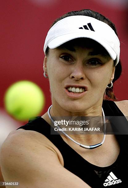 Martina Hingis of Switzerland eyes the ball during her WTA Qatar Total Open quarter-final game against Daniela Hantuchova of Slovakia in Doha, 01...