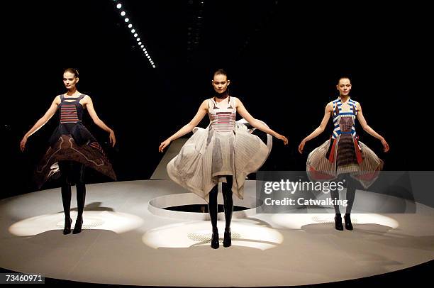 Models walk the catwalk during the Hussein Chalayan fashion show as part of Paris Fashion Week Autumn/Winter 2008 on February 28, 2007 in Paris,...