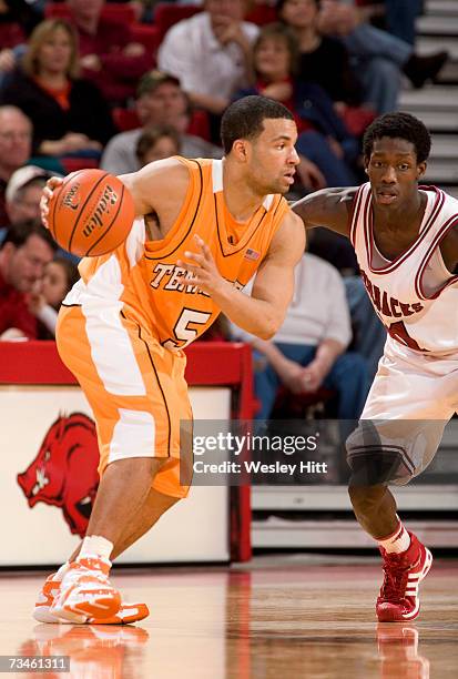 Guard Chris Lofton of the Tennessee Volunteers looks to drive to the basket against the Arkansas Razorbacks at Bud Walton Arena on February 24, 2007...