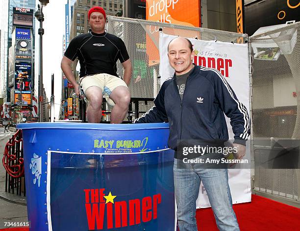 Rob Corddry tests the water as 95.5 WPLJ DJ Brad Blanks gets ready to get dunked to promote Rob Corddry's new show The Winner on Fox held at Times...