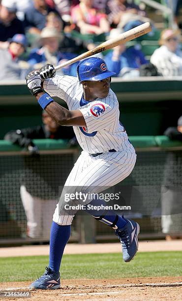 Center fielder Alfonso Soriano of the Chicago Cubs bats against the San Francisco Giants during Spring Training on March 1, 2007 at Hohokam Park in...