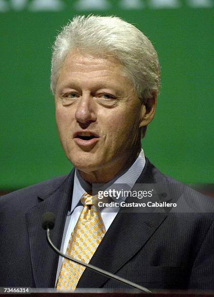 Former US President Bill Clinton speaks to students during his Spring Convocation address at The Bank Atlantic Center at The University of Miami on...