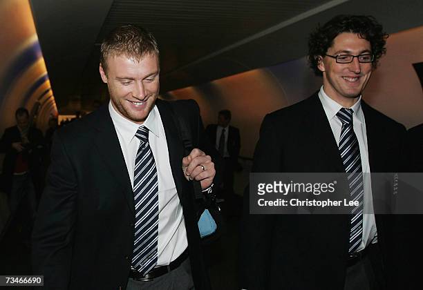 Andrew Flintoff and Jon Lewis of England walk through Gatwick Airport as they depart for the Cricket World Cup on March 2, 2007 in Gatwick, England.