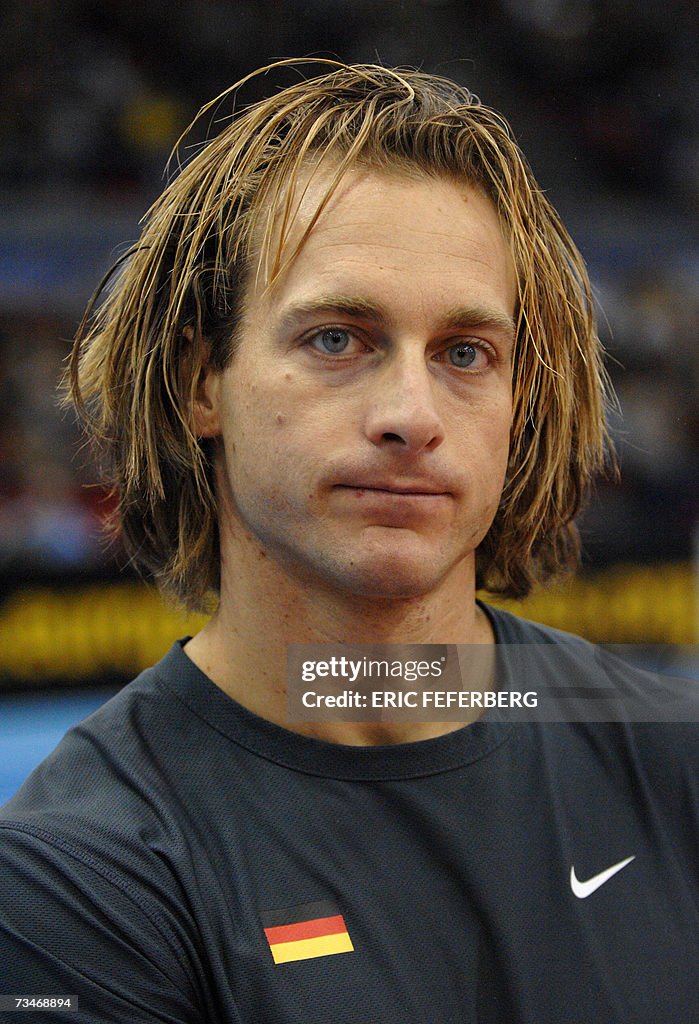 Lobinger German Tim Lobinger gets ready before competing in the Pole vault ...