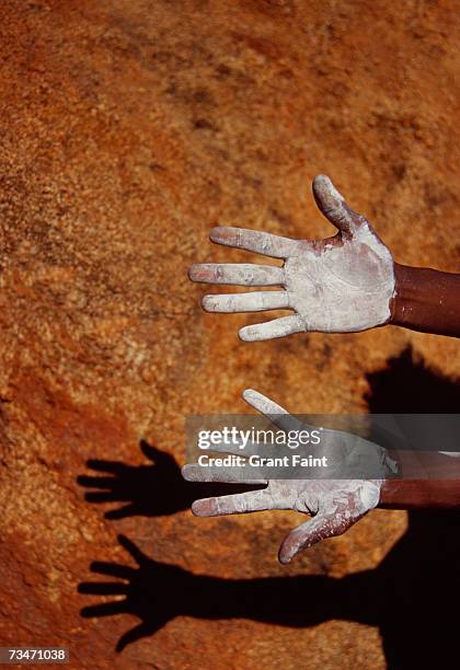 aboriginal man's hands with paint - aboriginal stock pictures, royalty-free photos & images