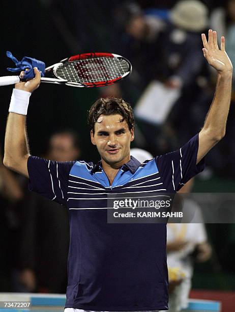 Dubai, UNITED ARAB EMIRATES: Roger Federer of Switzerland celebrates after beating Tommy Haas of Germany during their semi-final match for the ATP...