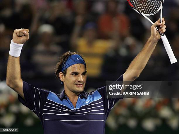 Dubai, UNITED ARAB EMIRATES: Roger Federer of Switzerland celebrates after beating Tommy Haas of Germany during their semi-final match for the ATP...