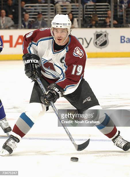 Joe Sakic of the Colorado Avalanche skates the puck into the offensive zone against the Los Angeles Kings during their NHL game on February 24, 2007...