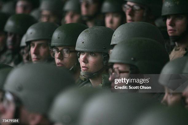 Soldiers take shelter from the rain at the rifle range during Army basic training at Fort Jackson March 1, 2007 in Columbia, South Carolina. In 2006,...