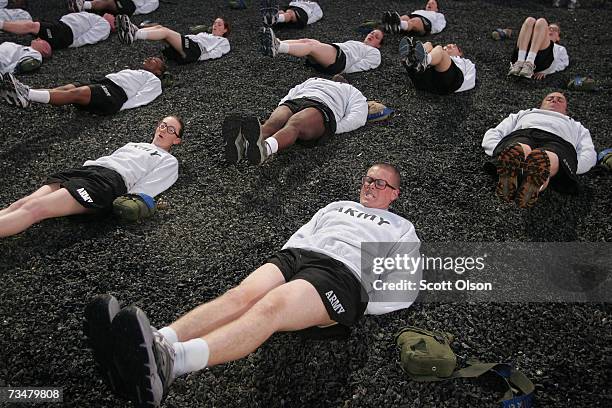 Soldiers do physical training before sunrise during Army basic training at Fort Jackson March 1, 2007 in Columbia, South Carolina. In 2006, the Army...