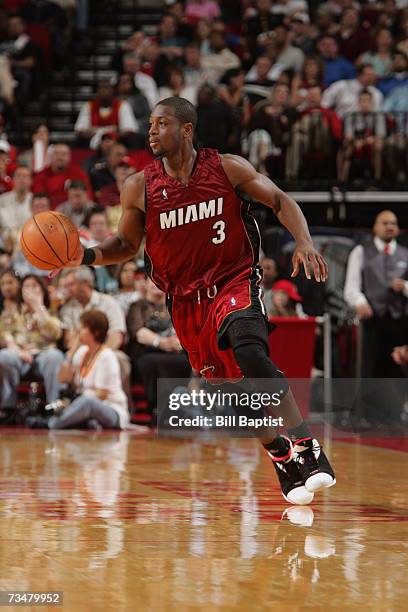 Dwyane Wade of the Miami Heat drives the ball up court during a game against the Houston Rockets at the Toyota Center on February 21, 2007 in...