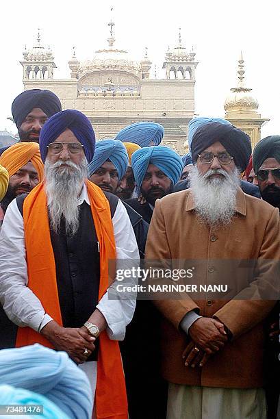 Newly-elected Chief Minister of India's northwestern state of Punjab Parkash Singh Badal of the regional Shiromani Akali Dal party along with Cabinet...